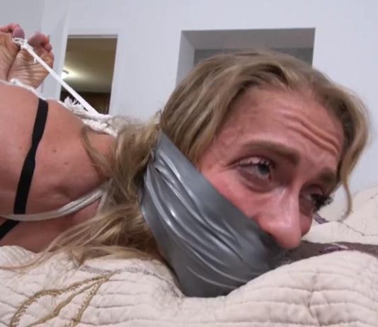 Buff Blondi Bound and Gagged on Her Bed – Bound To Be GAGGED 8-buff-blondi-silver-duct-tape-gag-toe-tied-hogtie-closeup-boundtobegagged
