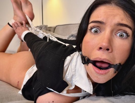 Tatti Debt Collector Ring Gagged Fucked Hard & Creampied In Hogtie – Tatti Roana Bondage Tatti with wide shocked eyes and ring gag drooling heavily while her bound legs are held high on the sofa – Tatti Roana Bondage