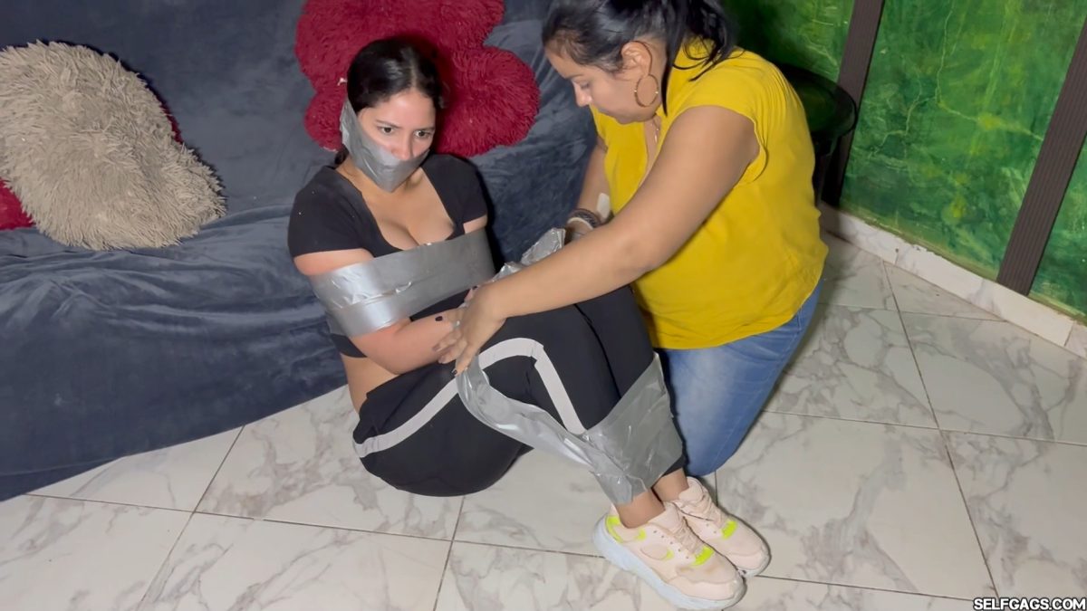Nana sitting while her legs are heavily duct tape bound Selfgags