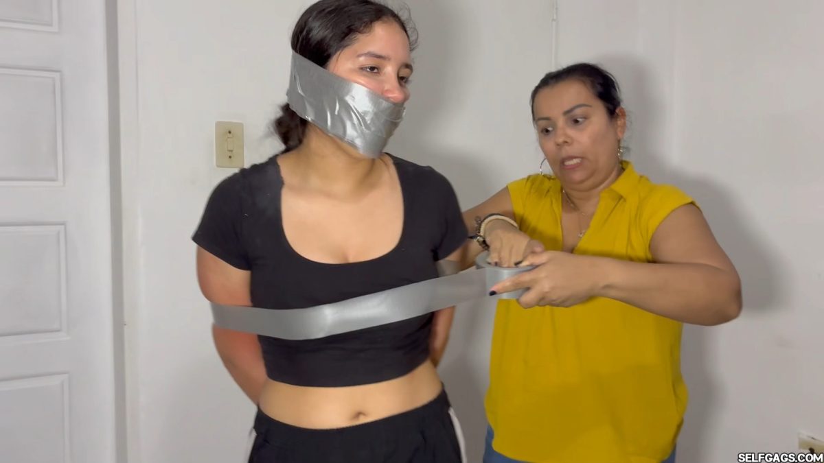 Nana getting her chest and arms wrapped in silver duct tape Selfgags