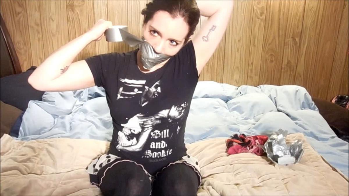 Girl gagged with dirty panties and duct tape