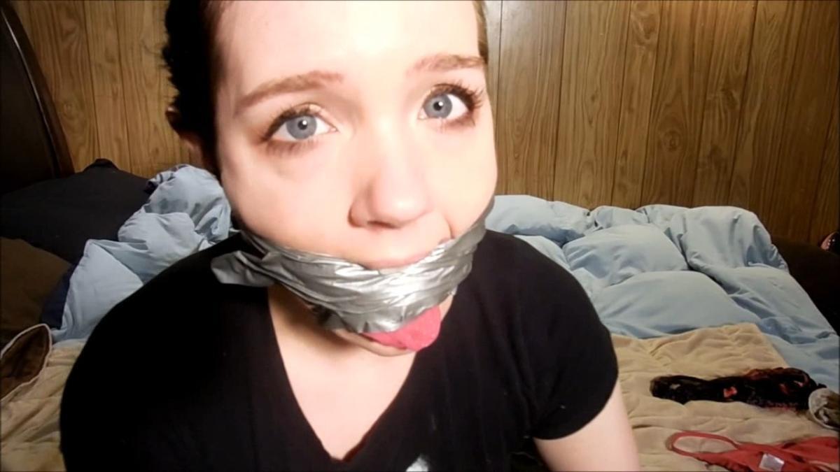 Girl gagged with dirty panties and duct tape