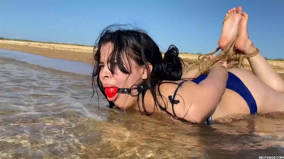Beach-Girl-Hogtied-In-The-Shallows-17