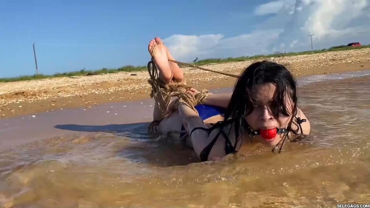 Beach-Girl-Hogtied-In-The-Shallows-19