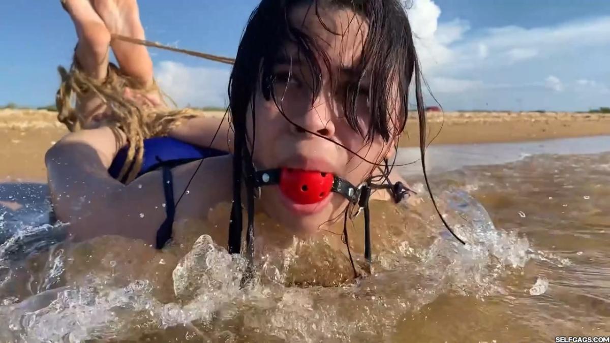 Beach-Girl-Hogtied-In-The-Shallows-28