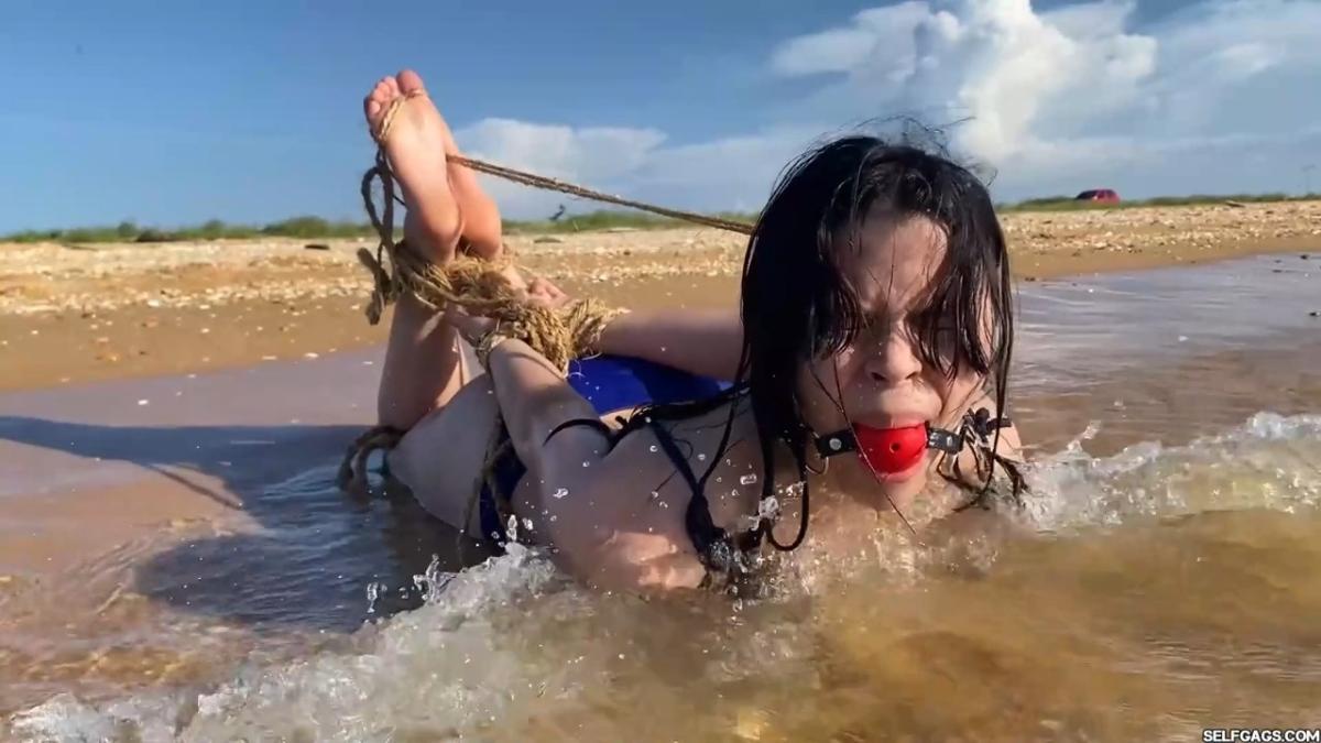 Beach-Girl-Hogtied-In-The-Shallows-31