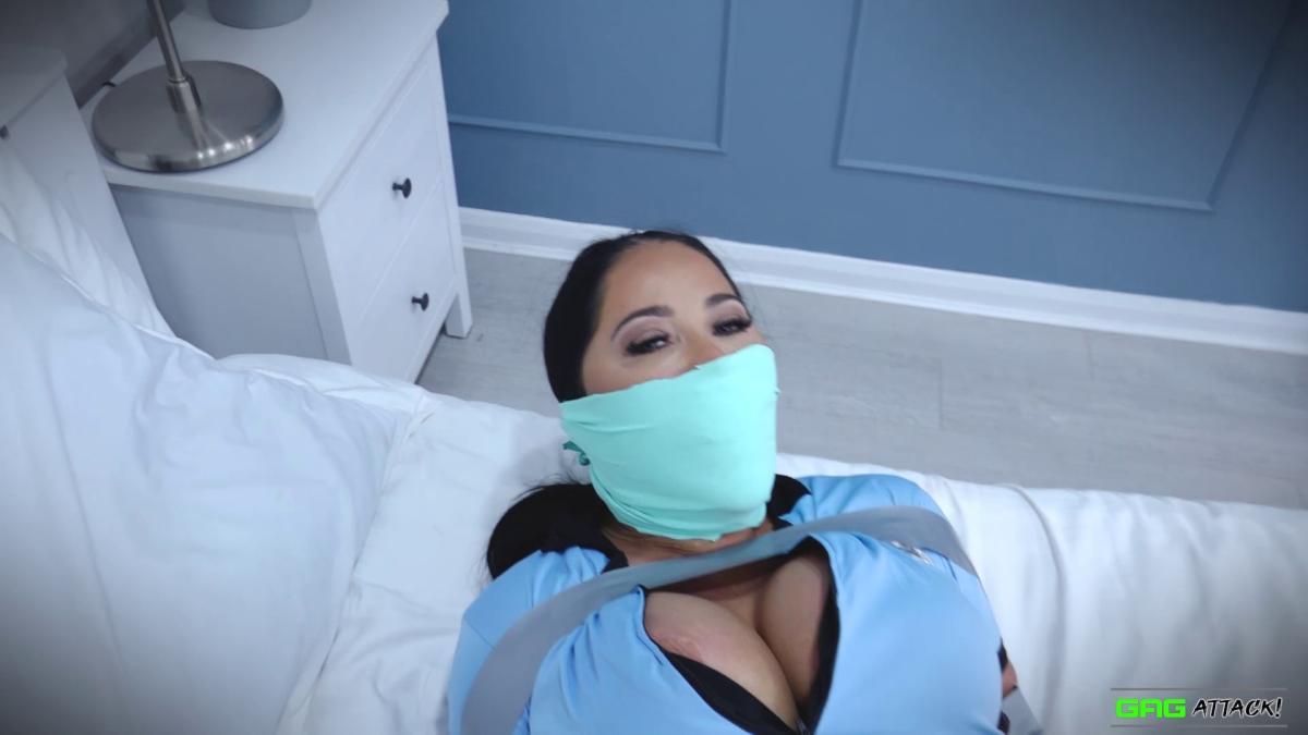 Busty lady cop Jacqui Ryland in bondage
