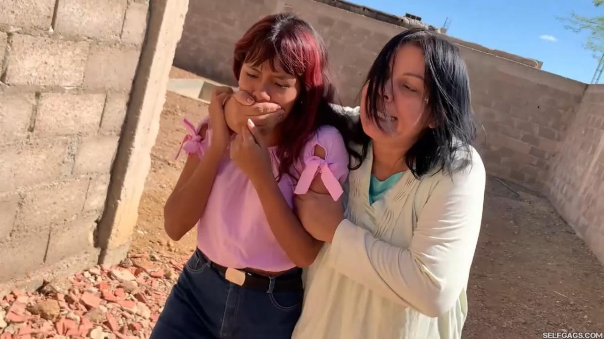 Curious-Sisters-Rope-Bound-And-Tape-Gagged-By-Crazy-Woman-In-Abandoned-House-2