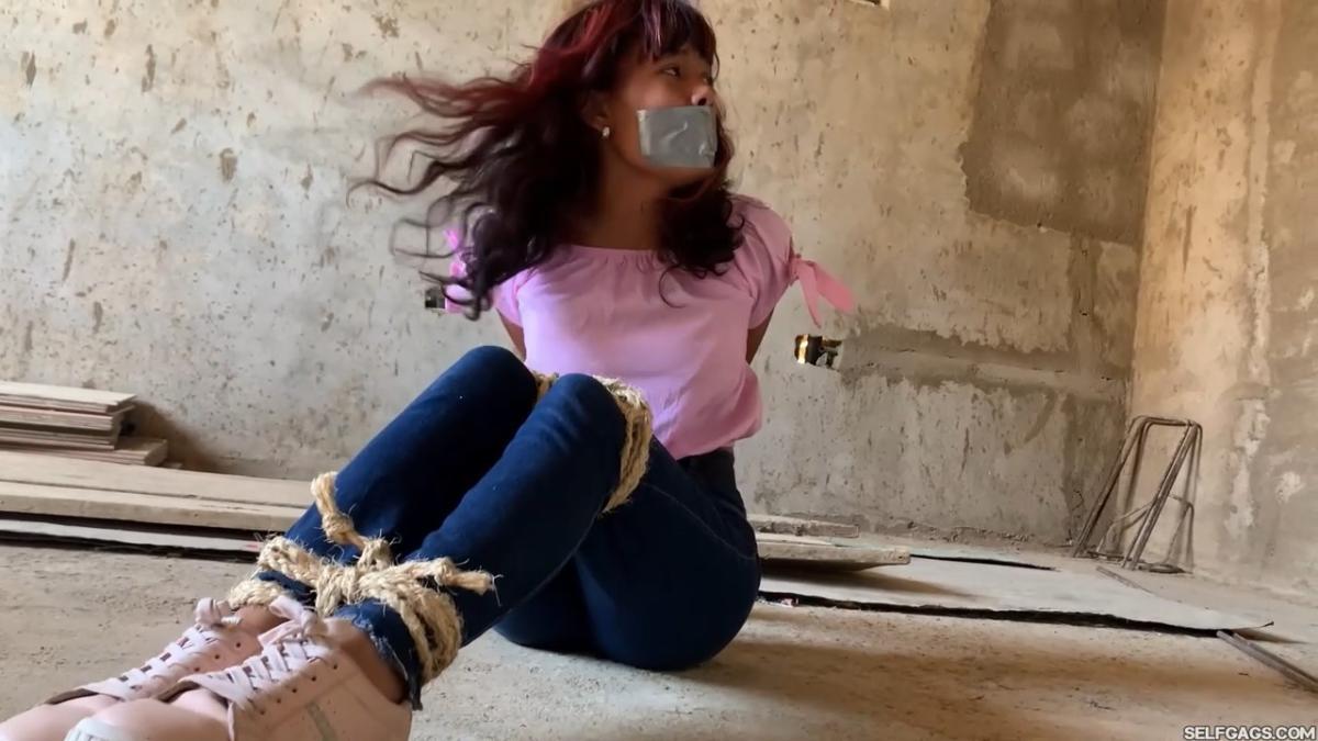 Curious-Sisters-Rope-Bound-And-Tape-Gagged-By-Crazy-Woman-In-Abandoned-House-2