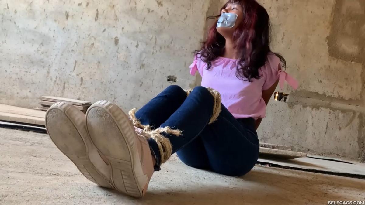 Curious-Sisters-Rope-Bound-And-Tape-Gagged-By-Crazy-Woman-In-Abandoned-House-2