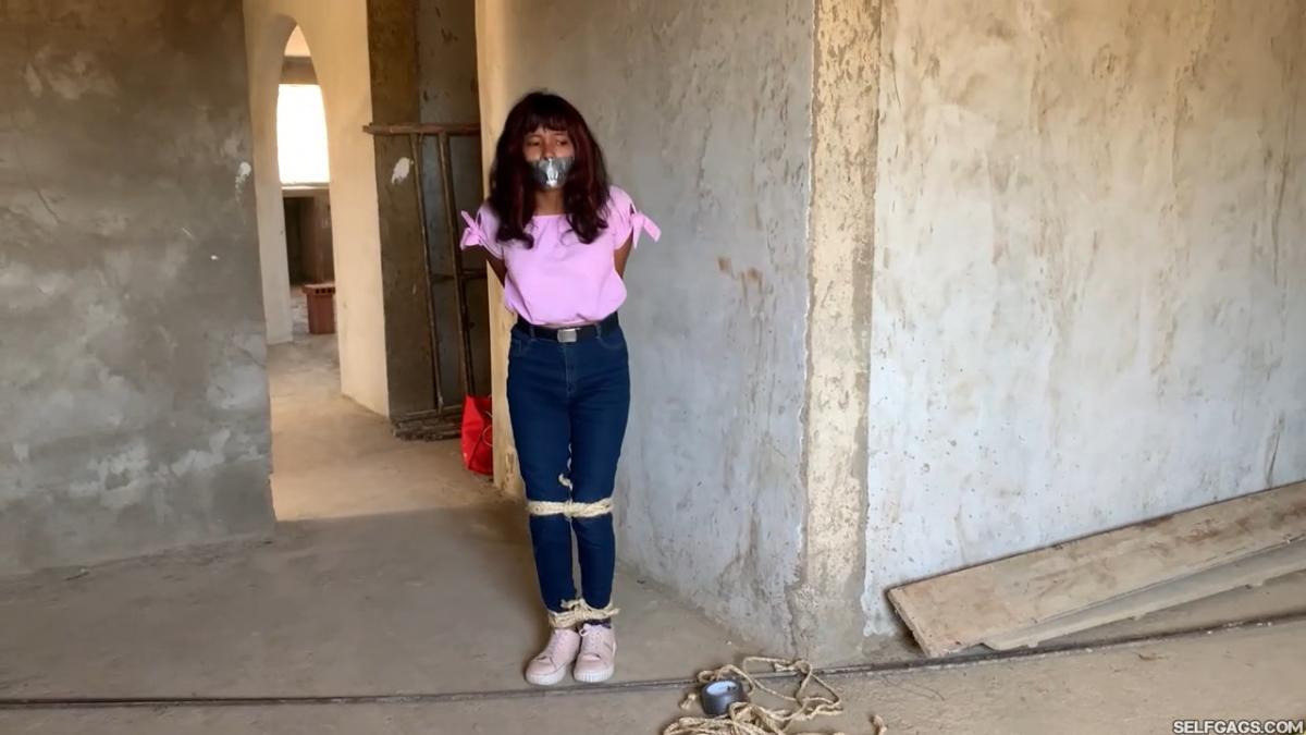 Curious-Sisters-Rope-Bound-And-Tape-Gagged-By-Crazy-Woman-In-Abandoned-House-2