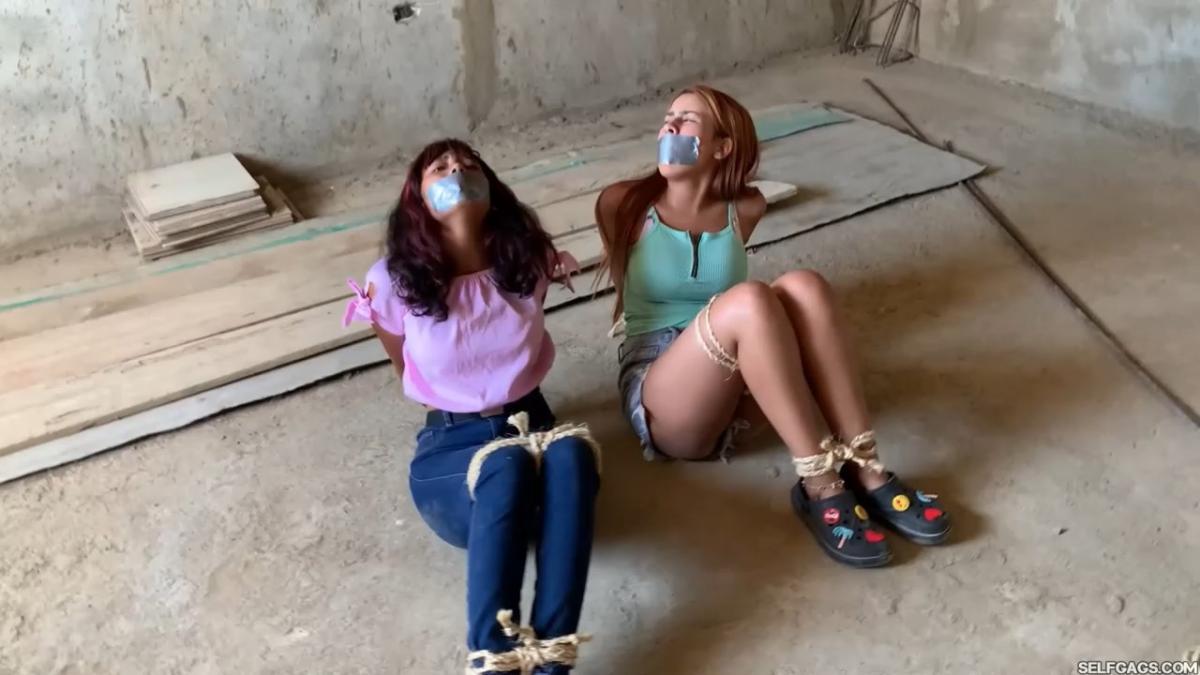 Curious-Sisters-Rope-Bound-And-Tape-Gagged-By-Crazy-Woman-In-Abandoned-House-2