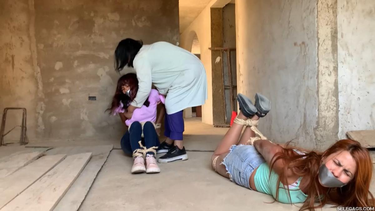 Curious-Sisters-Rope-Bound-And-Tape-Gagged-By-Crazy-Woman-In-Abandoned-House-2