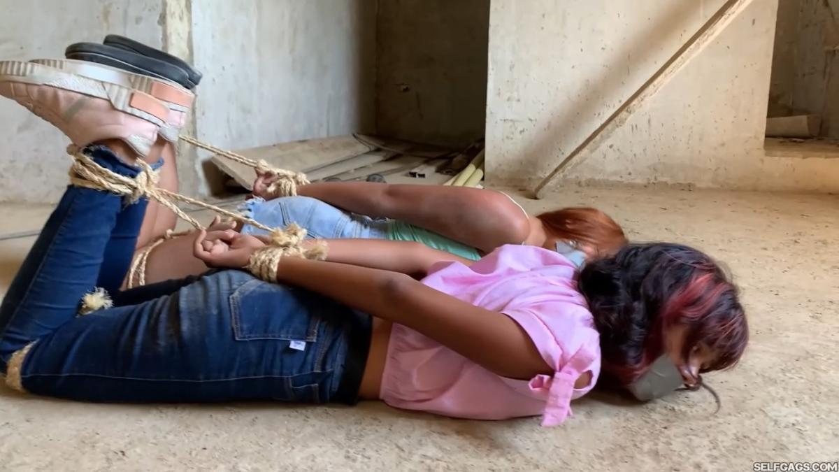Curious-Sisters-Rope-Bound-And-Tape-Gagged-By-Crazy-Woman-In-Abandoned-House-2