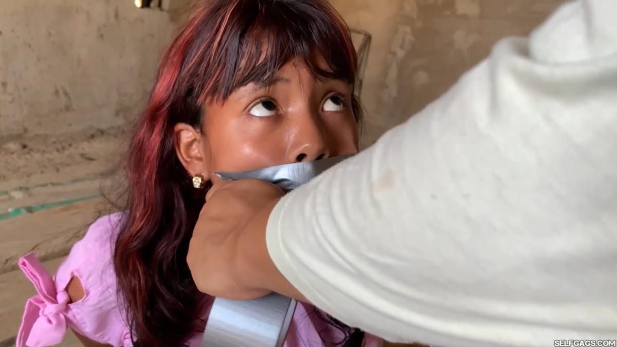 Curious-Sisters-Rope-Bound-And-Tape-Gagged-By-Crazy-Woman-In-Abandoned-House-2