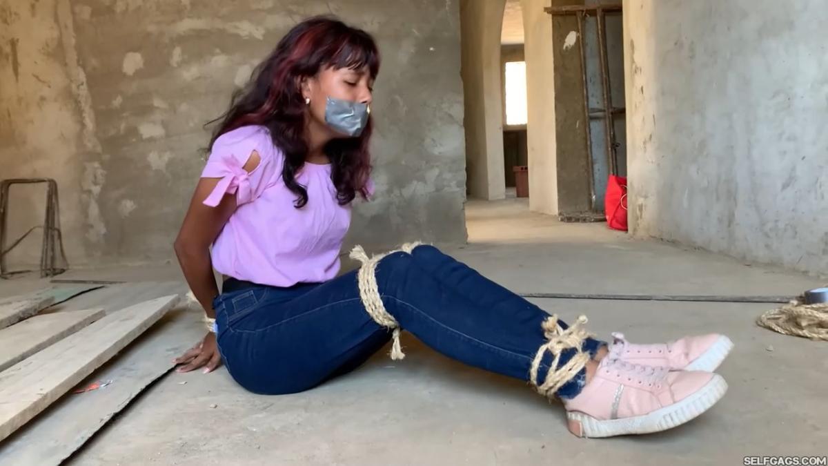 Curious-Sisters-Rope-Bound-And-Tape-Gagged-By-Crazy-Woman-In-Abandoned-House-2