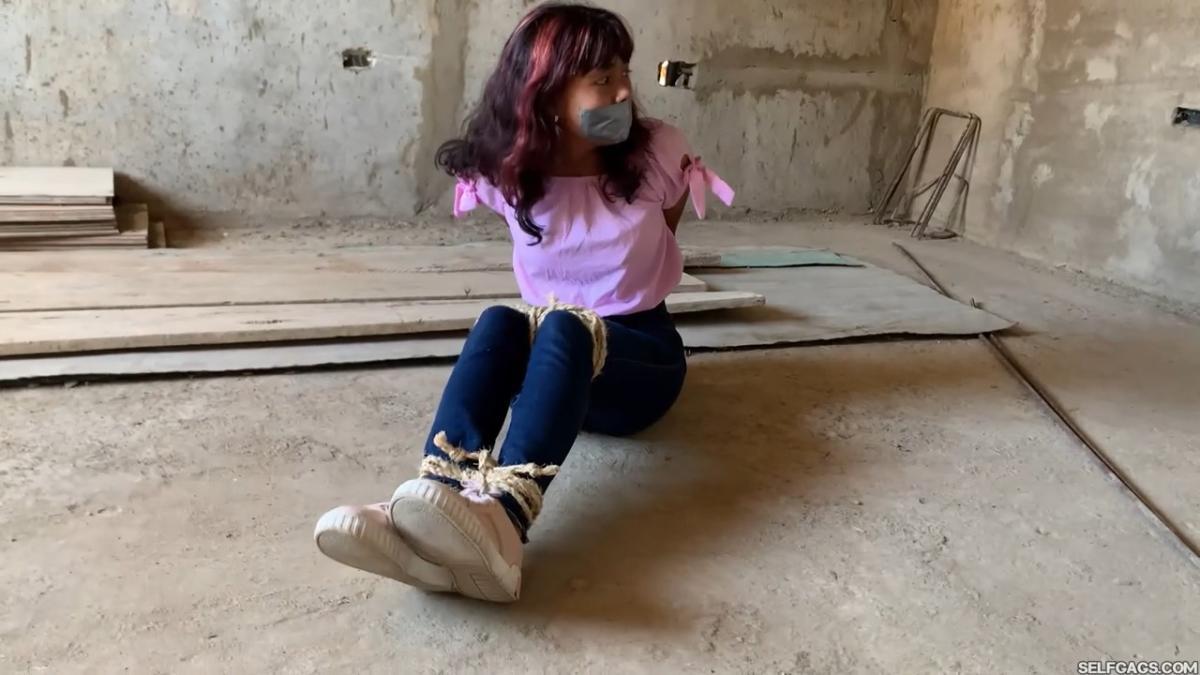 Curious-Sisters-Rope-Bound-And-Tape-Gagged-By-Crazy-Woman-In-Abandoned-House-2