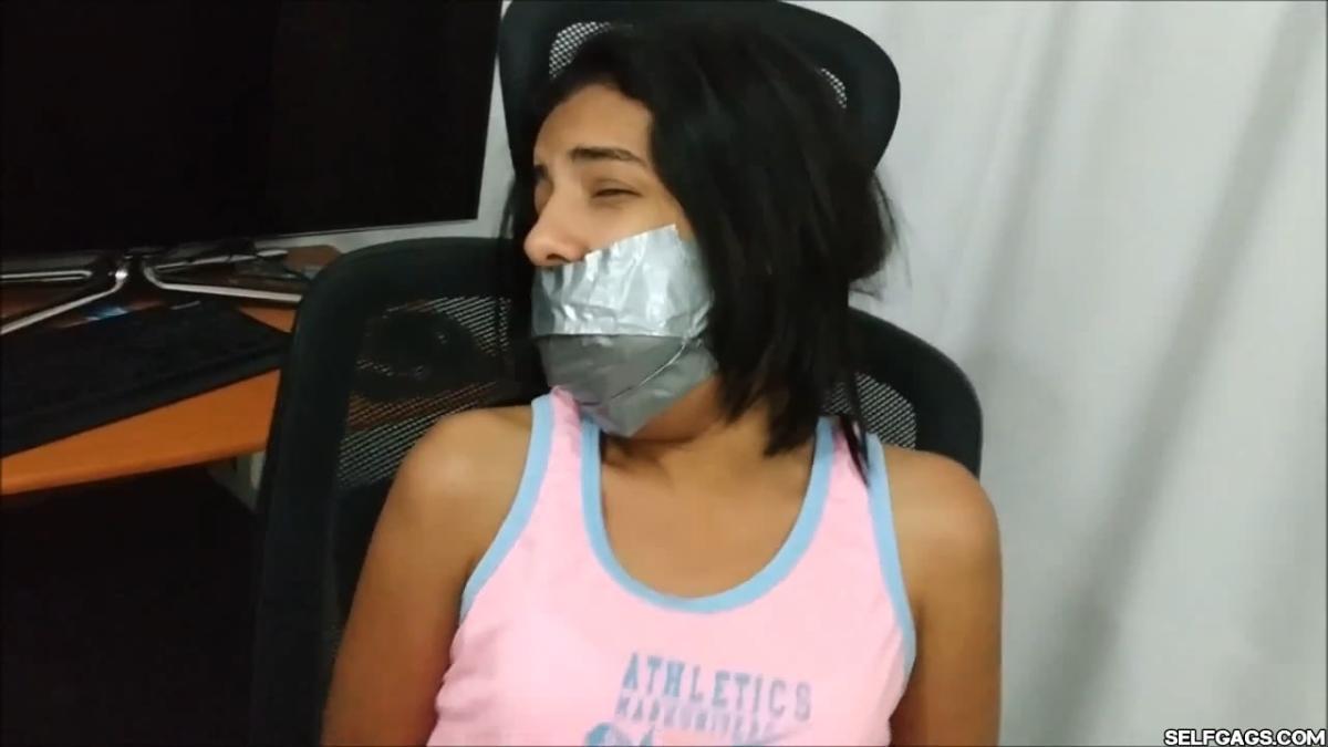 Cute-Babysitter-Hogtied-With-Shoe-Tied-To-Her-Face-16