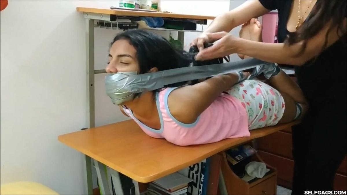 Cute-Babysitter-Hogtied-With-Shoe-Tied-To-Her-Face-30