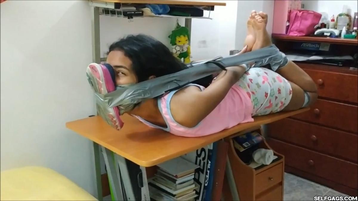 Cute-Babysitter-Hogtied-With-Shoe-Tied-To-Her-Face-37