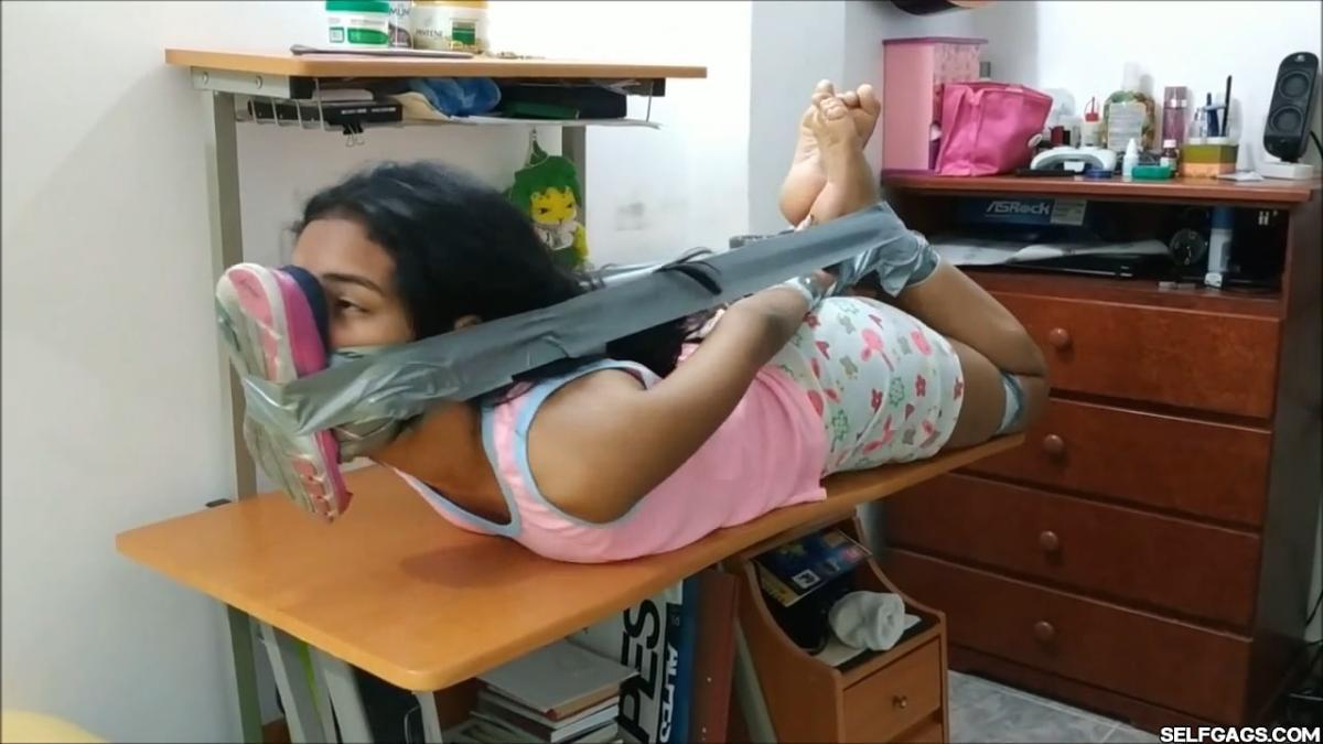 Cute-Babysitter-Hogtied-With-Shoe-Tied-To-Her-Face-54