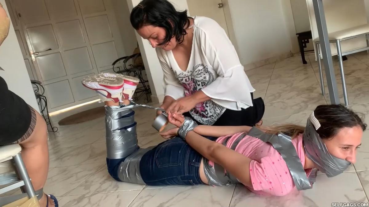 Four-Lovely-Ladies-In-Bondage-19