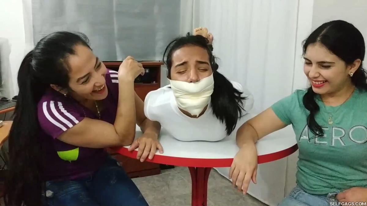 Hogtied-On-Table-With-Microfoam-Wrap-Gag-12
