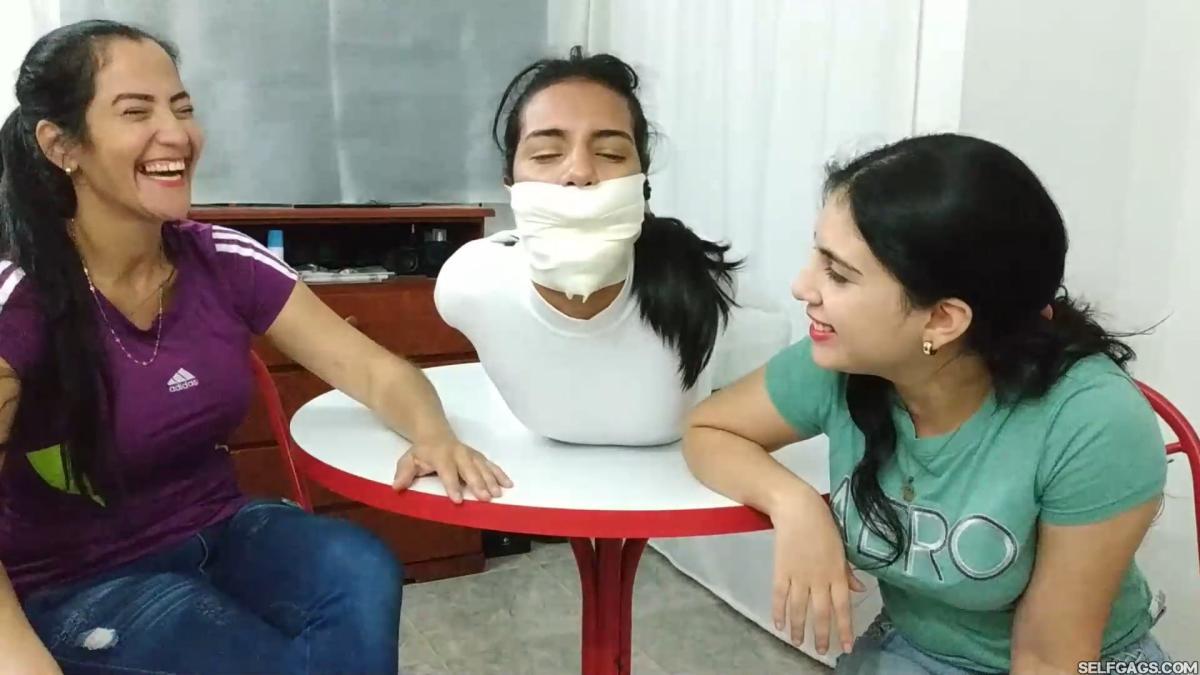 Hogtied-On-Table-With-Microfoam-Wrap-Gag-13