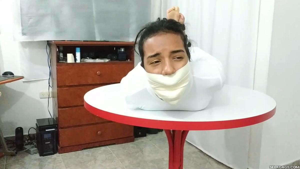 Hogtied-On-Table-With-Microfoam-Wrap-Gag-14