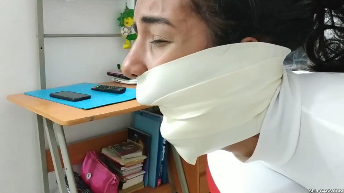 Hogtied-On-Table-With-Microfoam-Wrap-Gag-16