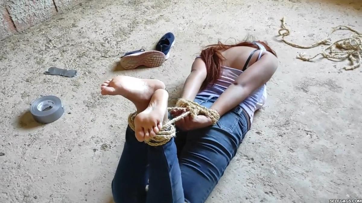 Hot-Study-Buddy-Hogtied-Barefoot-And-Left-Tape-Gagged-And-Helpless-In-An-Old-Prison-96