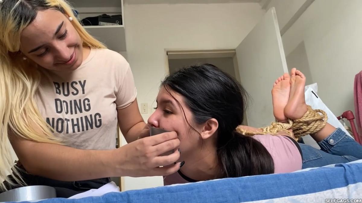 Lesbian-Bondage-Girl-Gagged-And-Hogtied-By-New-Neighbor-13