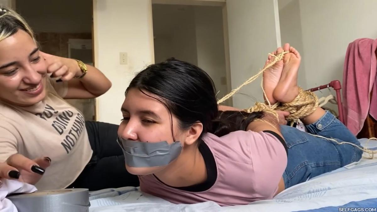 Lesbian-Bondage-Girl-Gagged-And-Hogtied-By-New-Neighbor-16