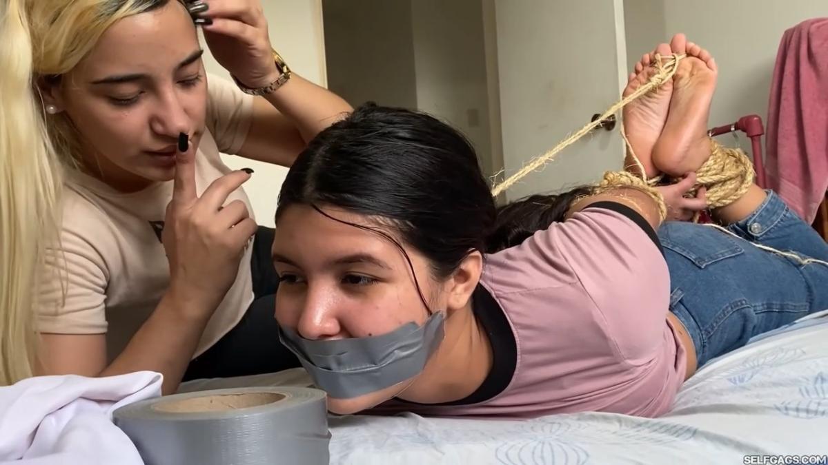 Lesbian-Bondage-Girl-Gagged-And-Hogtied-By-New-Neighbor-18
