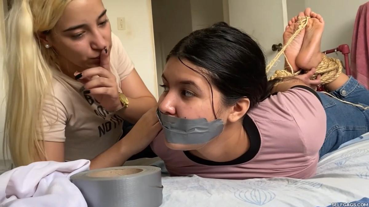 Lesbian-Bondage-Girl-Gagged-And-Hogtied-By-New-Neighbor-20