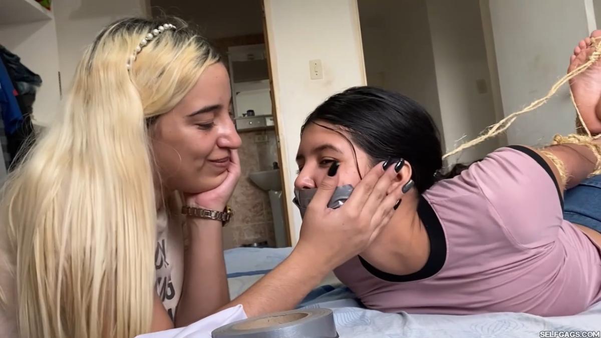 Lesbian-Bondage-Girl-Gagged-And-Hogtied-By-New-Neighbor-22