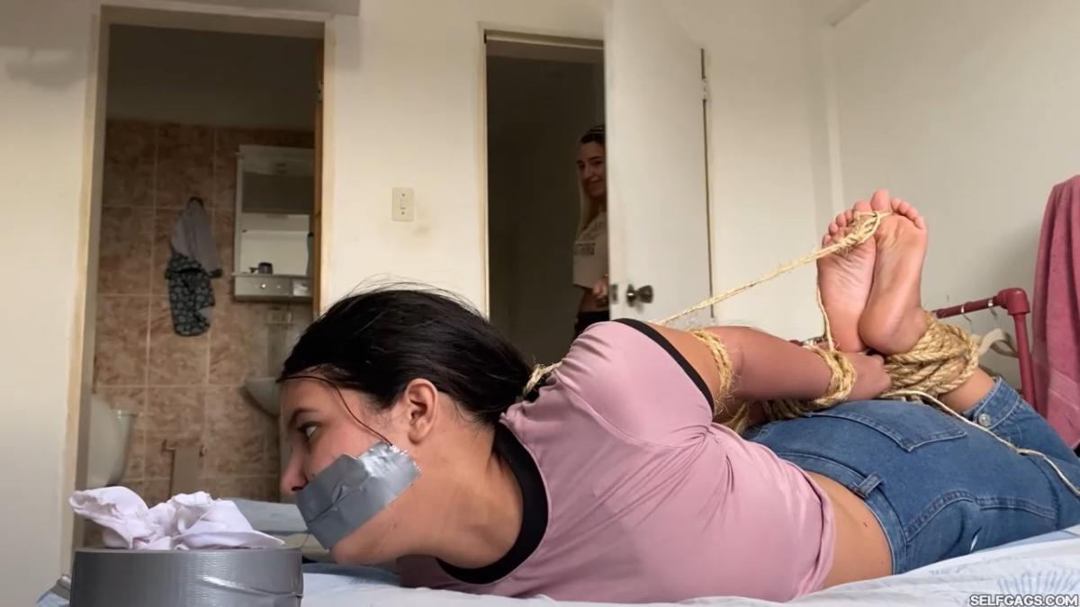 Lesbian-Bondage-Girl-Gagged-And-Hogtied-By-New-Neighbor-24