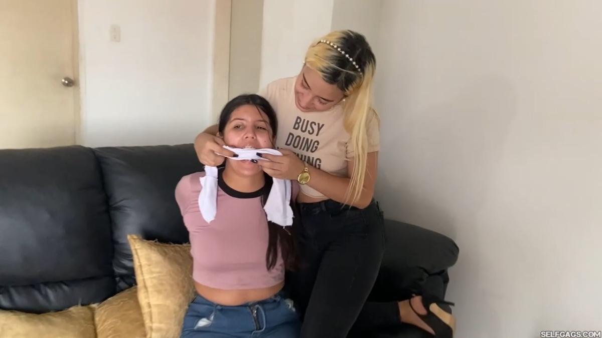 Lesbian-Bondage-Girl-Gagged-And-Hogtied-By-New-Neighbor-4