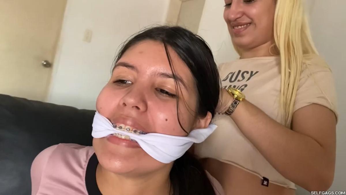 Lesbian-Bondage-Girl-Gagged-And-Hogtied-By-New-Neighbor-5