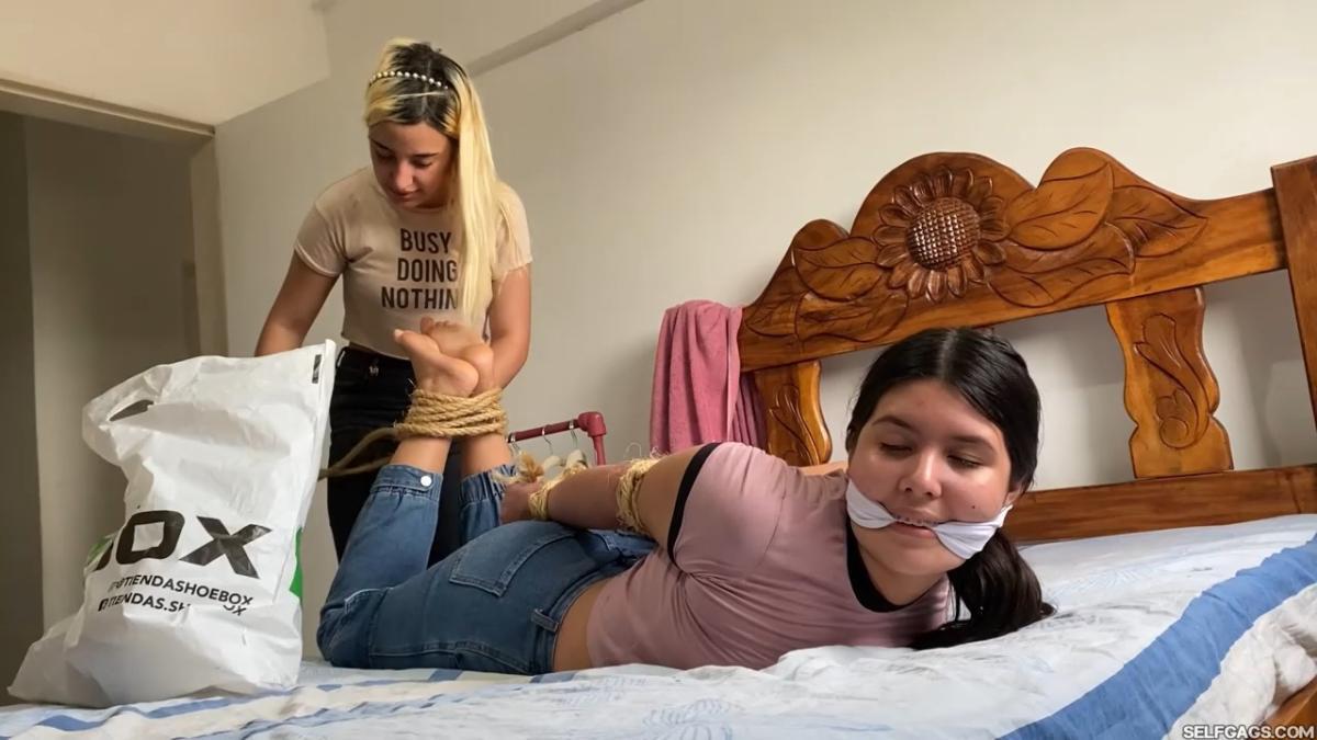 Lesbian-Bondage-Girl-Gagged-And-Hogtied-By-New-Neighbor-9