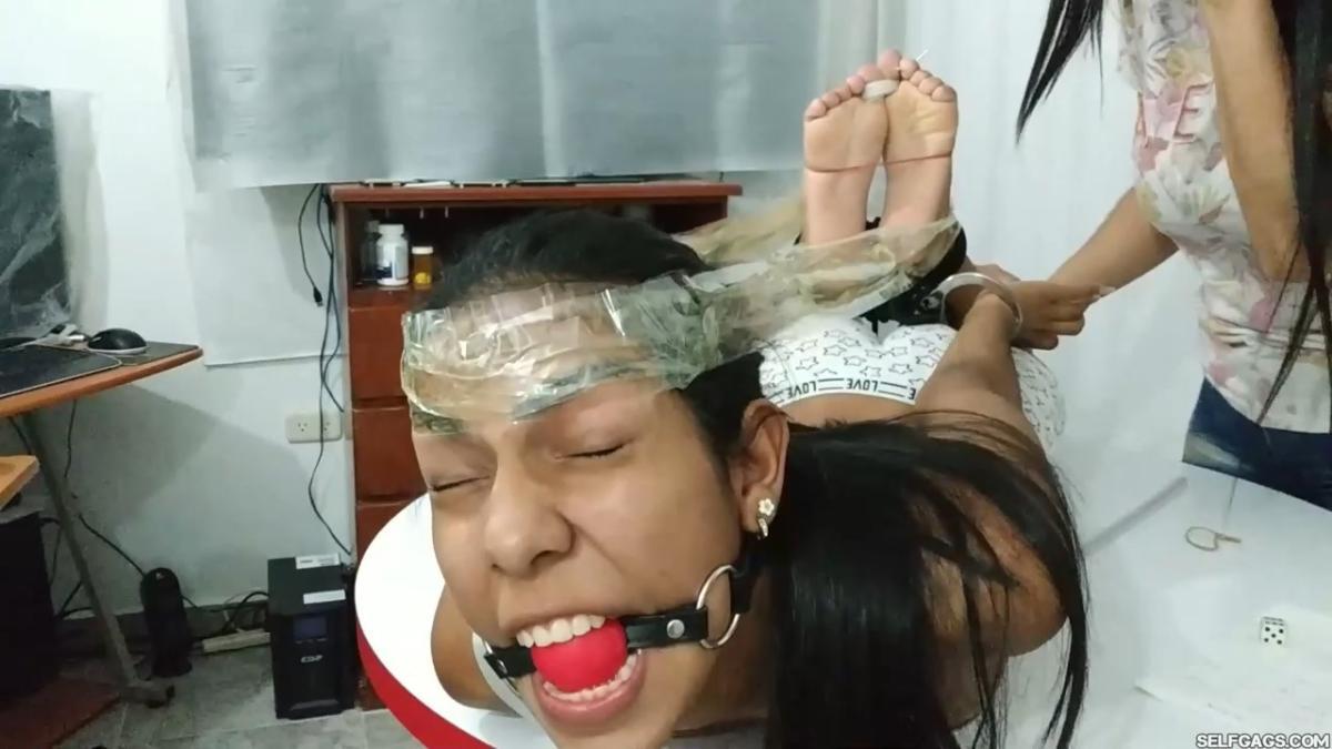 Maria-Martinez-Hogtied-During-Dice-Bondage-Game-15