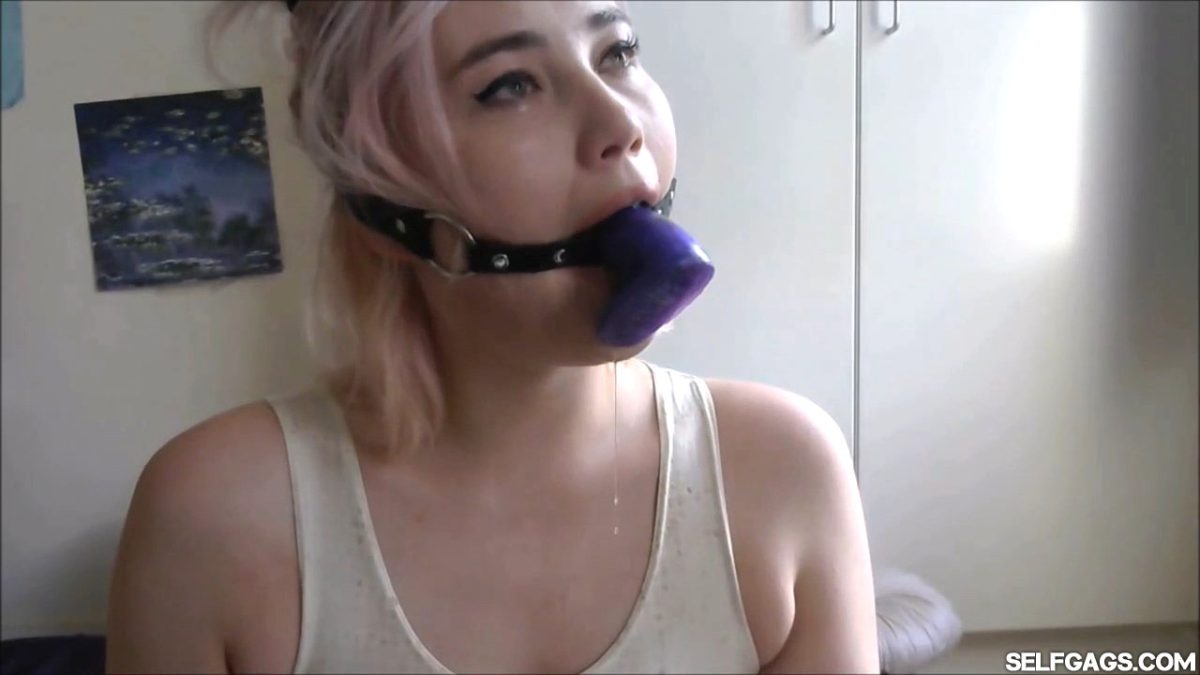 Misha Mayfair ring gagged and sucking dildo in video for Selfgags