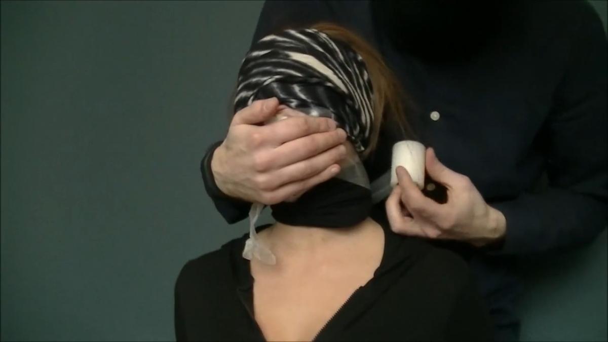 Blindfolded college girl gagged