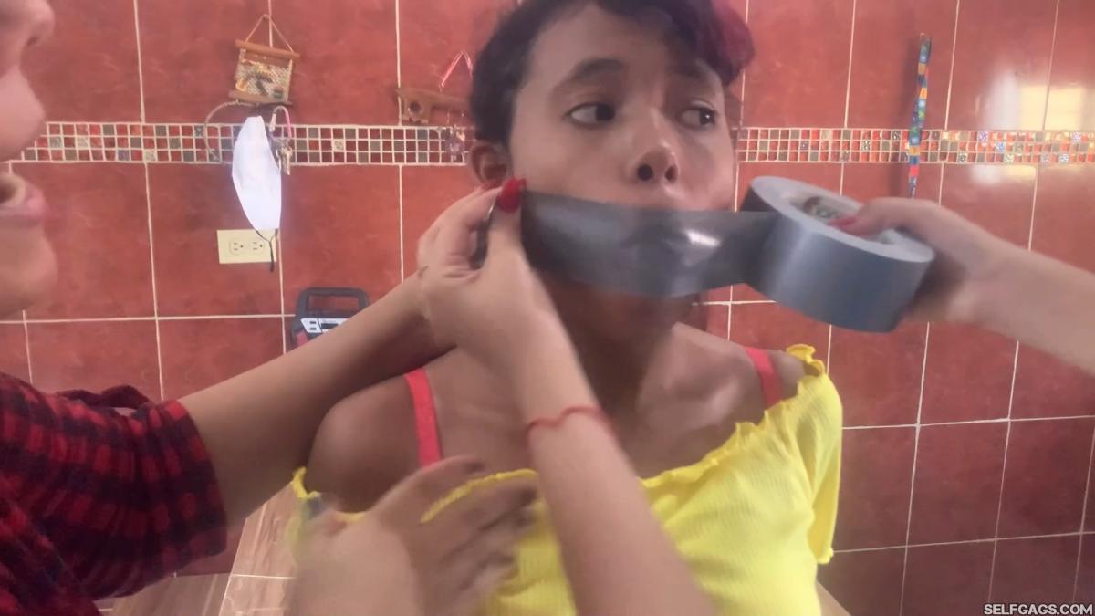 Duct tape gagged girl