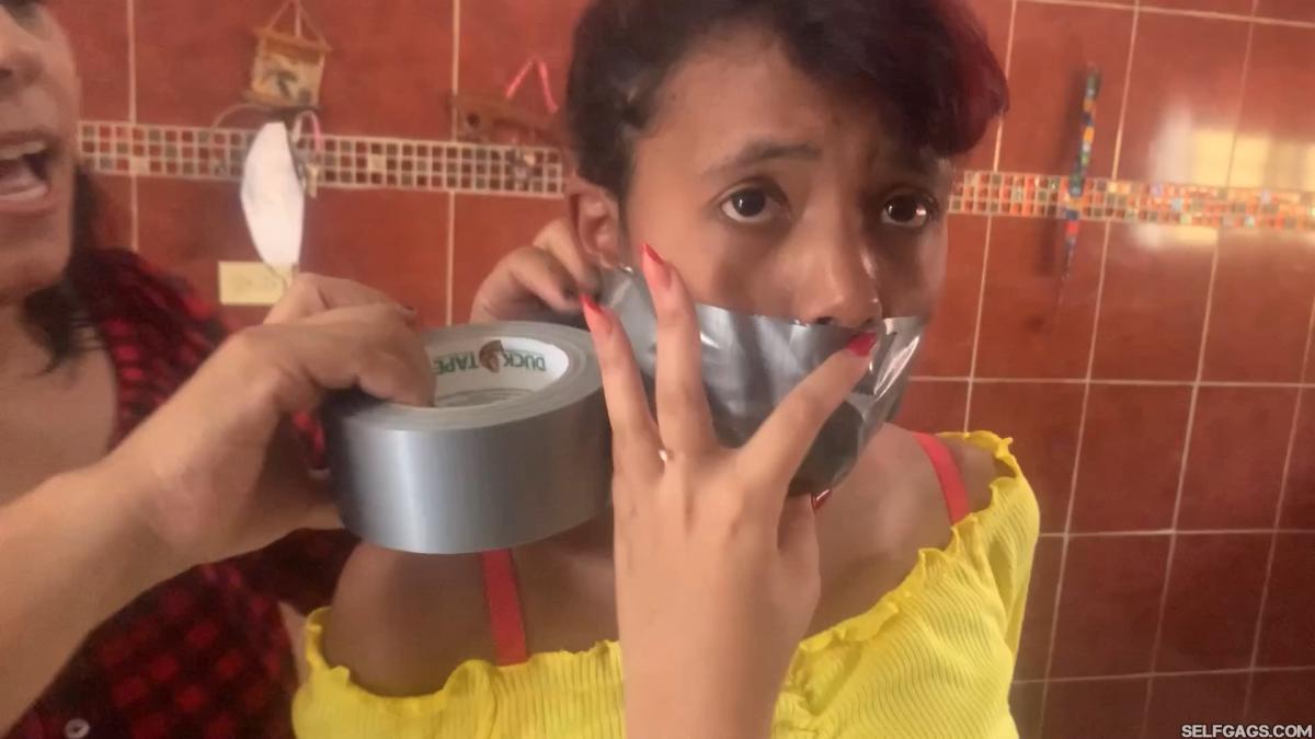 Cute girl duct tape gagged tight