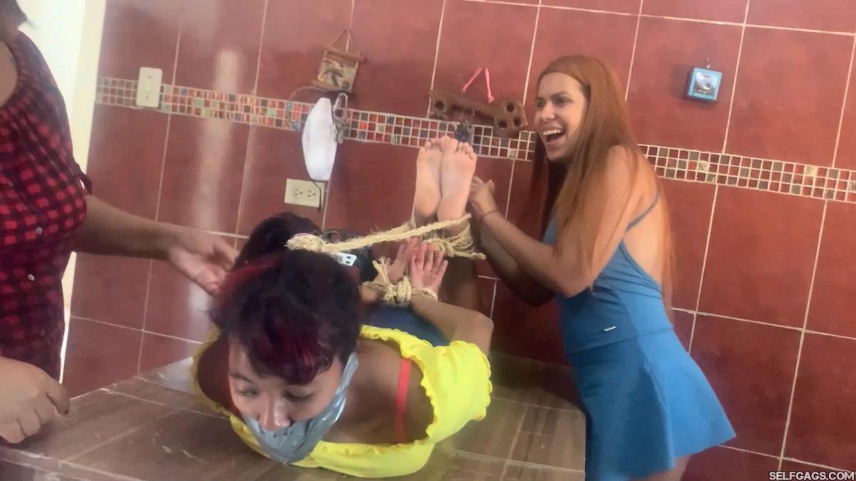 Barefoot lesbian bondage hogtie