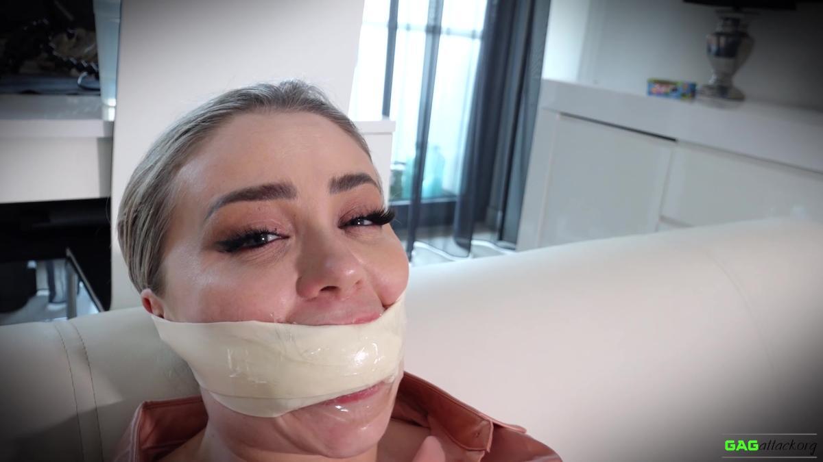 Secretary-in-Tape-Bondage-Aubrey-Gag-Attack-14