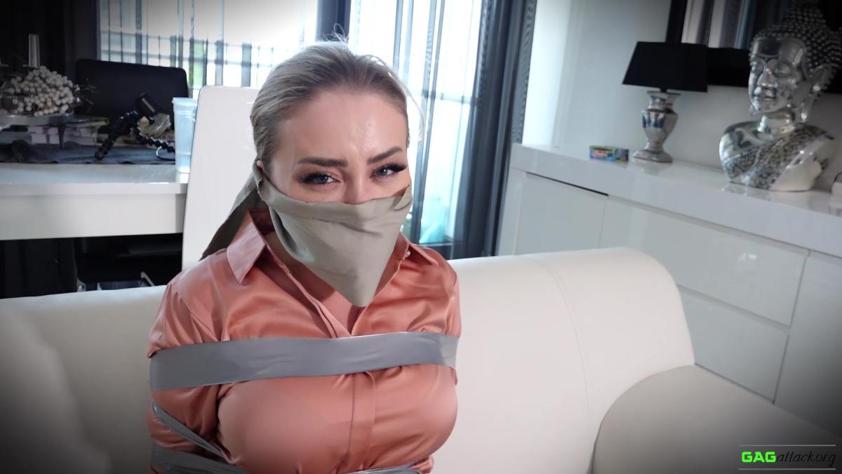 Secretary-in-Tape-Bondage-Aubrey-Gag-Attack-16