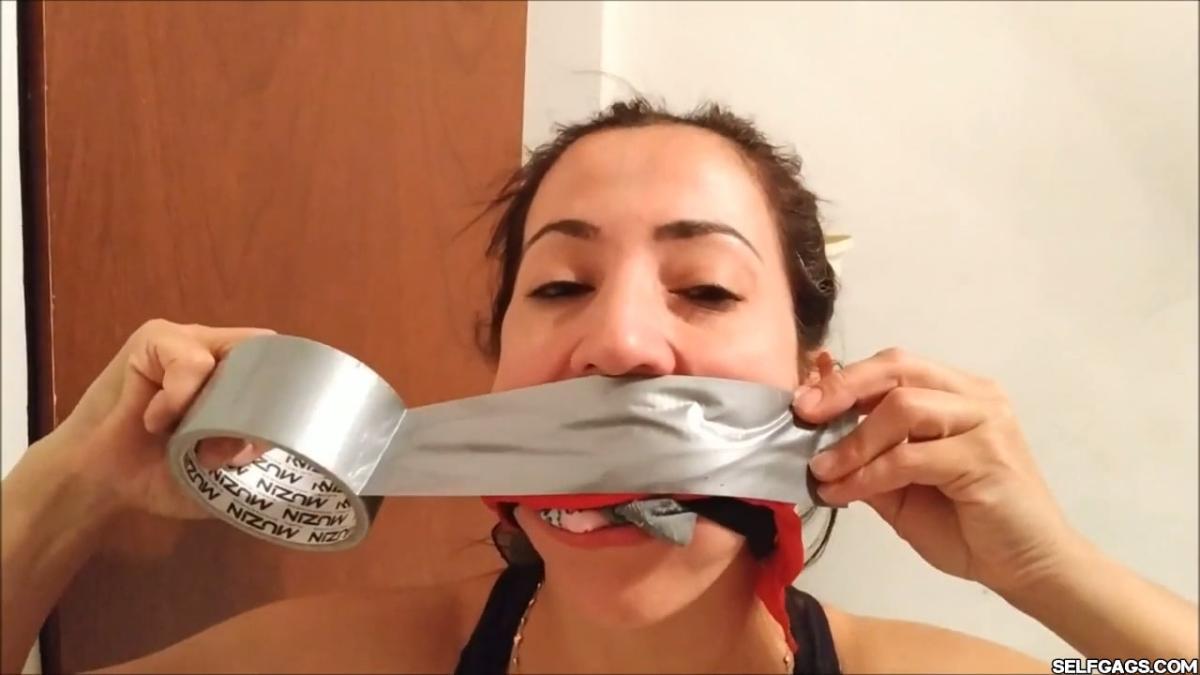 Sexy self-gagged Latina MILF