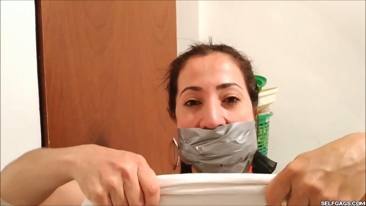 Sexy self-gagged Latina MILF